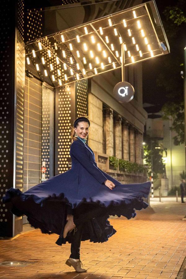 Qt Auckland Hotel Exterior photo A member of the staff at the hotel